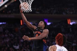 **Alt Text:** Fans buying Knicks vs 76ers tickets for an exciting NBA playoff game at Madison Square Garden.
