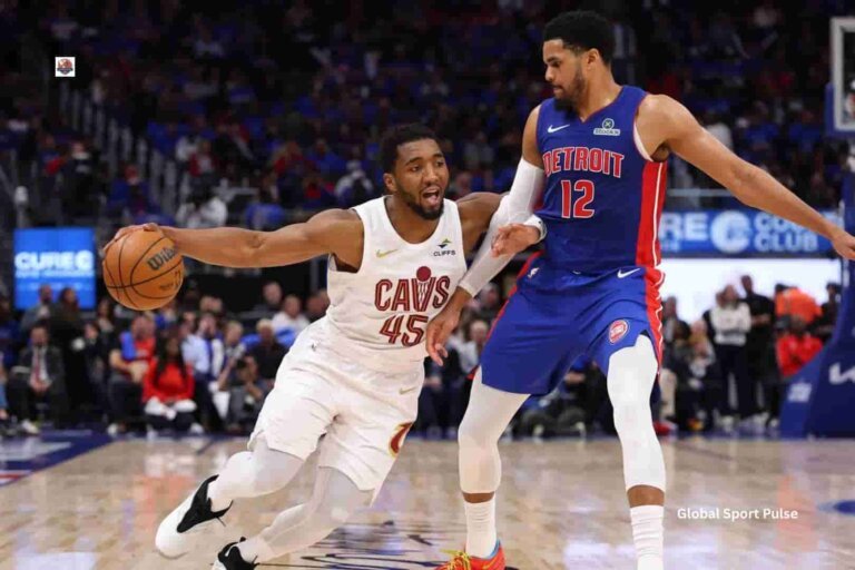Alt Text: Cleveland Cavaliers (Cavs) players celebrating during an intense NBA playoff game in front of a packed arena crowd.