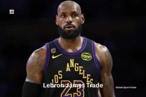 LeBron James dribbles the basketball during an NBA game while wearing his team jersey.
